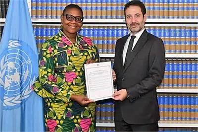 Photo from Zambian Foreign Ministry showcasing the delivery of the "instrument of accession" to the UN.